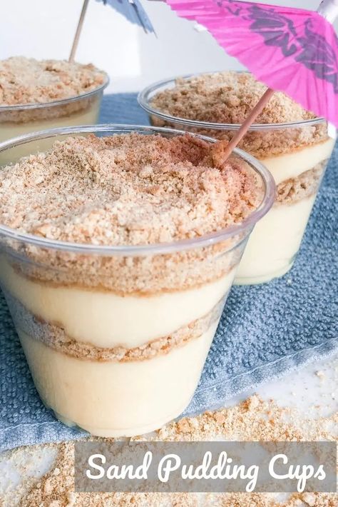 Filled with crushed graham crackers and vanilla pudding, Sand Pudding Cups are sure to be a hit at a beach themed party or any fun surf side celebration! #beachparty #kidsparty #vanillaparfait #easydessert Parfait Desserts Easy, Sand Pudding Cups, Sand Pudding Dessert, Beach Theme Desserts, Sand Dessert, Sand Pudding, Pudding Cup Recipes, Coconut Bread Recipe, Beach Dessert