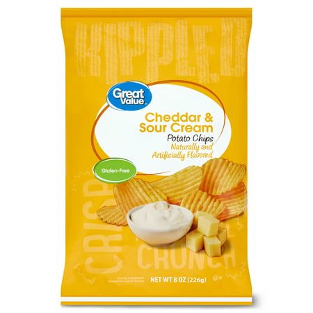 Get the party started with Great Value Cheddar & Sour Cream Rippled Potato Chips! This 8-ounce bag of potato chips is a must have for your next party. The delicious cheesy flavor pairs perfectly with the delightful hint of sour cream, making these an absolutely irresistible bite to eat. Bring them out at your next pool party, tailgate, picnic, or beach day. Children and adults alike will adore this classic flavor of potato chip. Pack them in school lunches or stash a bag in your office for a delectable midday snack. Pair these chips with onion or ranch dip for an outrageous explosion of flavors. Serve them with a sandwich or burger for that authentic deli style experience. Bring out the flavor with Great Value Cheddar & Sour Cream Rippled Potato Chips! Great Value products provide families Tailgate Picnic, Gluten Free Potato Chips, Snacks For School Lunches, Sour Cream Potatoes, Cheddar Potatoes, Sour Foods, Midday Snack, Deli Style, Creamed Potatoes