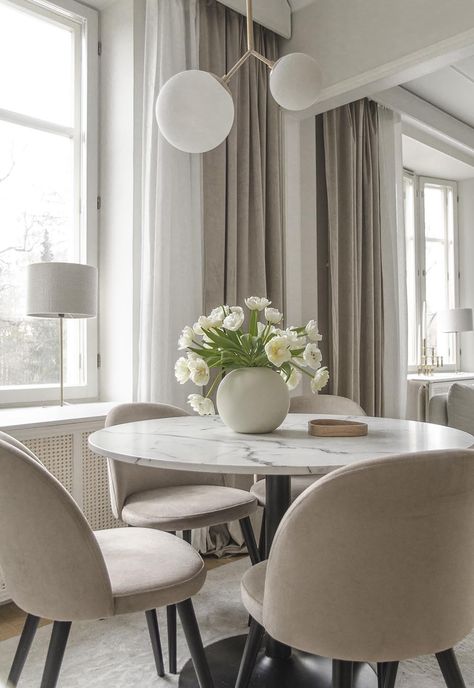 Home tour | Soft, neutral decor in Finland | These Four Walls Dining Chairs With Marble Table, Round Marble Dining Table Styling, Marble Round Dining Table Decor, Circle Marble Dining Table, Round Marble Kitchen Table, Round Dining Table Candle Decor, Beige Chairs Dining, Neutral Dining Room Round Table, Marble Circle Dining Table