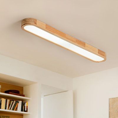 This wooden oval dimmable led flush mount seamlessly blends nordic and modern design elements, making it an ideal addition to various spaces such as bedrooms, living rooms, corridors, cafes, and offices. Crafted from solid wood and acrylic, the oval wood ceiling light boasts a lamp body made of rubber wood with distinct texture. Built-in LED light source eliminates the hassle of frequent bulb replacements. With evenly distributed LEDs, it offers over 80% high light output, while the remote contr Long Flush Mount Kitchen Light, Long Ceiling Light, Small Galley Kitchen Lighting, Walk In Closet Ceiling Light, Millennial Gray, Kitchen Flush Mount Lighting Ideas, Home Office Lighting Ideas, Long Ceiling Lights, Flush Mount Kitchen Lighting