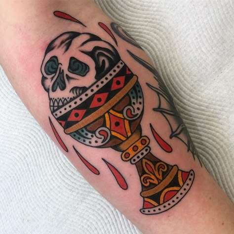 Joshua Gilbert on Instagram: “Skull and chalice for @b.colesy Thanks heaps dude. . . . . . . . . #tattoo #trad #traditional #tradtattoo #traditionaltattoo…” Chalice Tattoo Traditional, Traditional Goblet Tattoo, Chalice Tattoo Design, Traditional Medieval Tattoo, Medieval Traditional Tattoo, Goblet Tattoo, Skull Tattoo Traditional, Traditional Candle Tattoo, Skull Traditional Tattoo