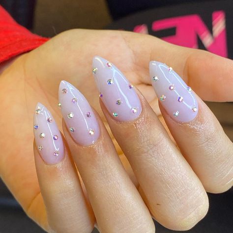 @elyfieldsnails shared a photo on Instagram: “Shine bright like a 💎 #diamonds #nude #purenude #swarovski #nails #nailsgrandrapids #nails💅 #nailalmond” • Oct 21, 2020 at 10:19pm UTC Nail Swarovski Designs, Diamond Nail Designs, Swarovski Nails, Diamond Nails, Nails Art, Almond Nails, Shine Bright, Beauty Nails, Stylish Nails