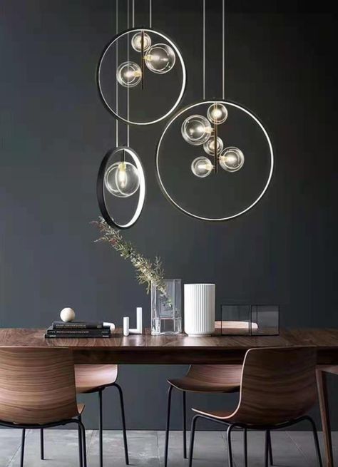 The lights with glass covers look like iridescent bubbles, attractive and fantastic, adding a touch of warmth to your space. #ceilinglight #pendantlight Iridescent Bubbles, Glass Globe Pendant Light, Round Pendant Light, Modern Lighting Chandeliers, Pendant Light Styles, Globe Pendant Light, Round Light, Metal Hanging Lights, Black Pendant Light