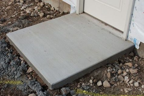 Whether it’s for a shed, stair landing, dog kennel or hot tub, a small concrete pad is an easy and inexpensive home improvement project. Turn that section of matted grass into a functional and practical surface with a little elbow grease and this know-how. ^ #Concrete #ConcreteProject #ConcreteProjects #Patio #ConcretePatio #DIY #DIYProject #DIYProjects #Cement #CementProjects #CementPatio #CementSidewalk #CementDIY Pouring Concrete Slab, Diy Concrete Patio, Cement Patio, Concrete Pad, Cement Diy, Stair Landing, Garage Conversion, Concrete Steps, Concrete Pavers