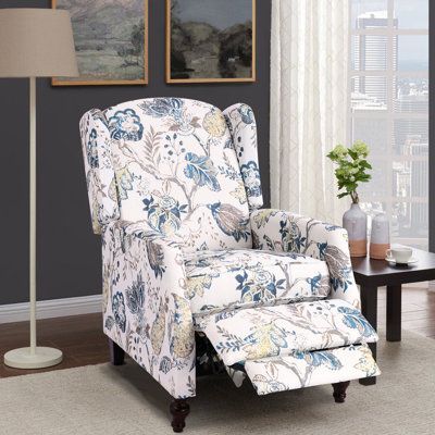 This chair wonderfully complements any decor with elegant cushions, polished wood legs, and a fully padded seat. The breathable fabric encases thick padded cushions to give you hours of comfortable, stylish sitting, while colorful floral gives this chair stunning. Body Fabric: Blue 100% Polyester | Alcott Hill® Damar 26.5" Zero Clearance Recliner Polyester in Blue, Size 39.8 H x 26.5 W x 28.7 D in | Wayfair Mid Century Modern Recliner, Wingback Recliner, Modern Recliner Chairs, Wall Hugger Recliners, Modern Recliner, Polished Wood, Florida Room, Condo Decorating, Swivel Recliner