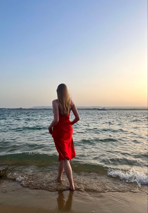 Beach aesthetic Red Dress At The Beach, Red Summer Dress Aesthetic, Red Dress Beach Photoshoot, Red Beach Aesthetic, Silk Dress Aesthetic, Red Beach Dresses, June Moodboard, Beach Aesthetic Sunset, 2024 Beach