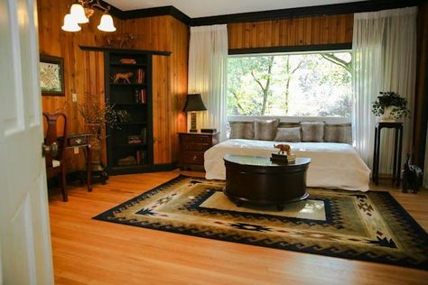 Knotty pine with black trim.  Fabulous! Wood Walls With Black Trim, Painted Wood Paneling Basement, Knotty Pine Walls With Black Trim, Knotty Pine Walls With Dark Trim, Basement Remodel Wood Paneling, Wood Panel Walls Bedroom, Renovating Wood Panel Walls, Pine Cabin Interior Wood Walls, 1950s Wood Paneling