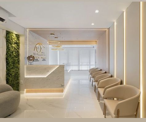 White And Gold Clinic Interior, Dentist Studio Design, Commercial Accent Wall Ideas, Dermatological Clinic Design, Modern Doctors Office Interiors, Dermatologist Office Design, Esthetician Office Ideas, Dental Office Name Ideas, Med Spa Design Modern