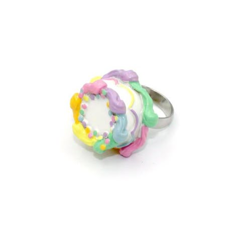 Details:- adjustable ring (best fits size 6 and up)-beautifully detailed pastel rainbow birthday cake-round cake frosted with vanilla buttercream and piped rainbow buttercream edges & lacy frosting decoration around the middle and topped with classic rainbow confetti sprinkles. -Glossy finish, durable-cake is 1.20" wide by 1/2" tallMatching Necklace and earrings in my shop>> http://fatallyfeminine.etsy.com**Made to order**May take up to 2 weeks to make before shipment. Each one may hav Pastel Rainbow Birthday Cake, Rainbow Buttercream, Old Fashioned Words, Pastel Rainbow Birthday, Mushroom Outfit, Kawaii Ring, Pastel Rainbow Cake, Kawaii Heart, Confetti Sprinkles