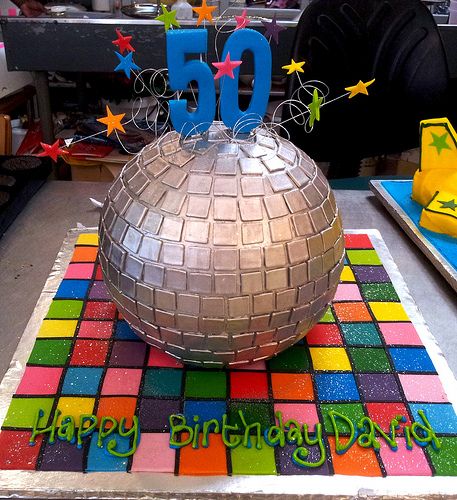 3D Disco ball shaped Wicked Chocolate cake, decorated with… | Flickr Disco Brunch, 70s Cake, Charleston Birthday, Disco Dance Floor, Chocolate Cake Decorated, Disco Ball Cake, Hippie Cake, Disco Cake, Disco Theme Party