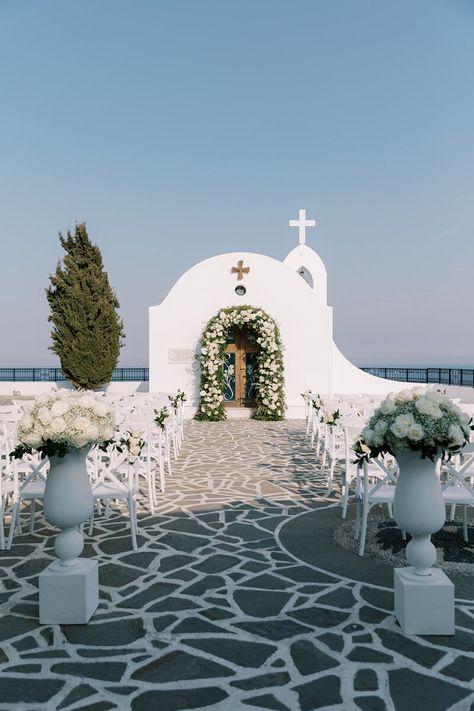 Contemporary Wedding in Kallithea Springs located in Rhodes, Greece. The ceremony took place in St. Sophia, with Faliraki sea view. We decorated the reception with stone, glass and mirrored elements. The flowers were white and greenery was used to make the black & white theme stand out. #destinationweddings #Greece #Rhodes #island #contemporarywedding #blackandwhite #weddingtheme #weddingdecor #weddingevent #weddingphotography #weddingplanning #faliraki #seaview #ceremony #flowerurns #arch Greek Wedding Theme, Mamma Mia Wedding, Wedding Color Schemes Blue, Rhodes Island Greece, Greek Islands Wedding, Small Beach Weddings, Greece Destinations, White Weddings Reception, Rhodes Island