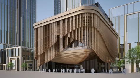 In Shanghai's historic Bund district, visitors circle a new theater with a brash -- and slowly rotating -- veneer of bronze-colored steel bamboo. Fantastic Architecture, Building Skin, Building Development, Wood Facade, Architectural Models, Parametric Design, Interesting Buildings, Amazing Buildings, Building Facade