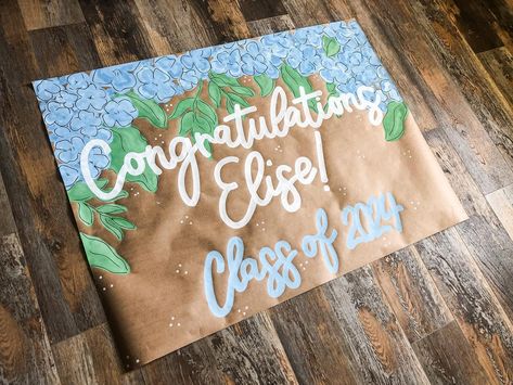 Graduation Flower Banners🫶🏼💐💙 Kraft Paper Banner, Banner Painting, Grad Party Banner, Painted Banners, Senior 25, Painted Banner, Senior Banner, Cute Banner, Grad Banner