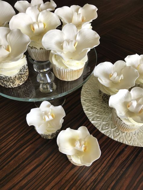 White Orchid Cupcakes White Cupcakes Aesthetic, Orchid Cake Wedding, Wedding Cakes Orchids, Orchids On Cake, Wedding Cake Orchids White, Orchid Wedding Cake, Flower Cupcakes, Cute Birthday Cakes, Just Cakes