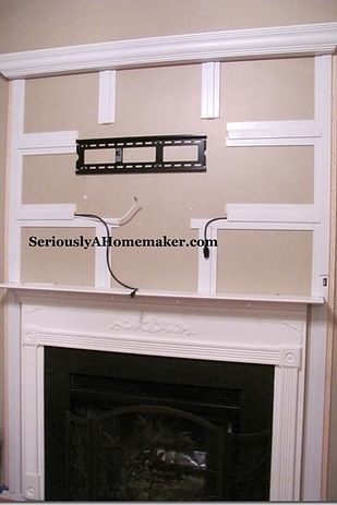 Hide your cords in trim work. | 36 Genius Ways To Hide The Eyesores In Your Home Hutchinson House, Hide Tv Cords, Tv Cords, Tv Mounted, House Upgrades, Hidden Tv, Rooms Design, Shelving Design, Diy Casa