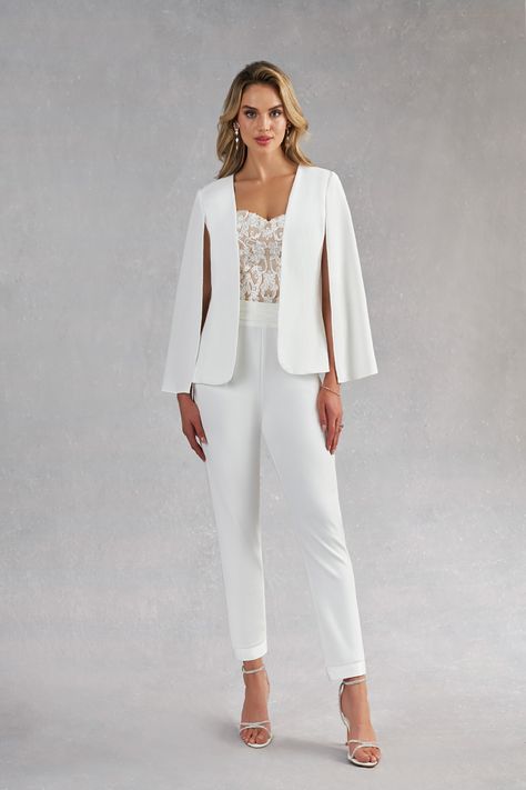 Surprise your guests with how modern you are by wearing our three-piece bridal pant suit, Tiffany. This style is made from stretch crepe, lace, and stretch satin. Her jacket is stylized with a cape instead of sleeves, the pants are high-waisted while the sweetheart bustier is drop-waisted to give a contoured look. The ankle length pants are a play on the tuxedo pant with a cummerbund waistband. Female Wedding Suit, Officiant Attire, Bridal Pant, Modern Elegant Wedding Dress, Lesbian Wedding Outfits, Wedding Suit Women, Bridal Pant Suit, Wedding Suits For Bride, Jumpsuit Modern