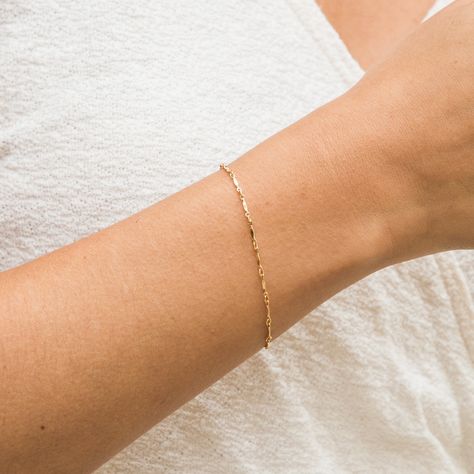 For those looking for a dainty bracelet that is absolutely darling, meet our Dapped Chain Bracelet. This bracelet is very lightweight and comfortable, making it perfect to wear all the time! We love it paired with the Chunky Curb Chain Bracelet. DETAILS 14k gold filled -or- sterling silver chain, lobster clasp, & findings Bracelet length: 6.5" with 1.5" extender Safe for sensitive skin & shower safe Matching necklace: Dapped Chain Necklace Dainty Jewelry Bracelets, Simple Gold Bracelet, Permanent Bracelet, Bracelets Simple, Permanent Jewelry, Gold Chain Design, Dainty Bracelet, Chain Bracelets, Simple Bracelets