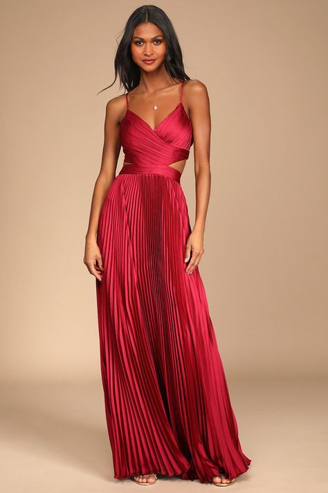 It will be clear just how glamorous you are in the Lulus Got the Glam Wine Red Pleated Cutout Maxi Dress! Sleek woven satin shapes this dress that has adjustable spaghetti straps, a surplice neckline, and a fitted bodice with padded cups. A back cutout peeks around to the sides atop a banded waist and an accordion-pleated maxi skirt. Exposed silver zipper on the top and hidden back zipper/clasp on the skirt. Fit: This garment fits true to size. Length: Floor length. Size medium measures 57.5" fr Red Dress For Bridesmaid, Red Velvet Formal Dress, Cotillion Dresses Long, Pleated Formal Dress, Satin Maxi Dresses, Dresses For A Gala, Red Formal Dresses Long, Pleated Dress Formal, Jewel Tone Dresses