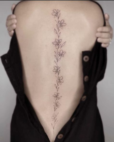 Lily And Vine Tattoo, Peony Tattoo Spine, Poppy Flower Tattoo Spine, Rose Vine Spine Tattoo, Flower Spinal Tattoo, Heart Spine Tattoo, Flower Spine Tattoos For Women, Lily Spine Tattoo, Floral Spine Tattoos For Women