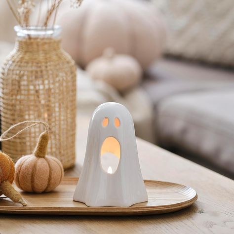 Ceramic Ghost Halloween Tea Light Holders Use our ceramic ghost Halloween tea light holders to create the perfect homely but spooky atmosphere. Perfect for any table, this tea light holder is ideal for adding a subtle hint of Halloween to any autumnal decor year after year. #Autumn #Fall #Autumnaesthetic #Fallaesthetic #AutumnColourPallet #FallColourPallet #AutumnDecor #FallDecor #Fall2023 #FallDecorIdeasForHome #Fall2023Trends #Gingerray #AutumnDecorIdeasForHome Ghost Ceramic, Ceramic Ghost, Halloween Date, Ginger Ray, Pottery Workshop, Tea Light Holders, Light Up Signs, Halloween Lights, Fall Halloween Decor