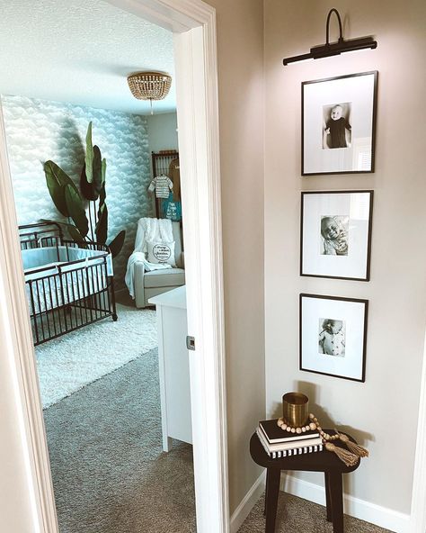 Upstairs End Of Hallway Ideas, Light Above Photo Wall, How To Decorate Small Hallway Wall, Under Picture Decor, Narrow Photo Wall, Family Photo Wall Entryway, Gallery Wall With Light Switch, Wall Gallery Lighting, End Hallway Wall Decor