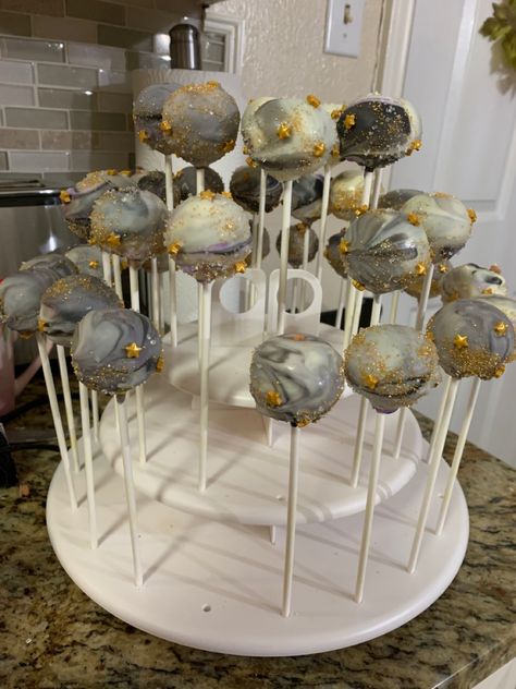 Cake Pops Moon And Stars, Cake Pops Space Theme, Marble Birthday Party Theme, Lunar Eclipse Party Ideas, Space Theme Cakesicles, Solar Eclipse Cake Pops, Eclipse Cake Pops, Celestial Cake Pops, Solar System Cake Pops