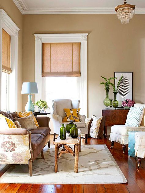 Neutral walls as a base is a great starting point for your personal flair! More living rooms here: http://www.bhg.com/rooms/living-room/makeovers/neutral-color/?socsrc=bhgpin071814neutralasabase&page=3 Neutral Living Room Colors, Cozy Family Rooms, Beige Living Rooms, Room Paint Colors, Room Color Schemes, Neutral Living Room, Family Room Decorating, Design Seeds, Paint Colors For Living Room