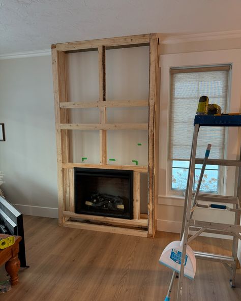 Swipe to see the evolution of our living room/fireplace wall! I love how this space turned out and the fireplace makes the space so cozy ☺️. #homevibes #fireplace #diyfireplace #diyhomedecor #makingourhouseahome #neutraldecor #beigehome #diyhomeimprovement #diyhomeprojects #buildingdesign #livingroomdecor Fireplace Electric Wall, Fireplace Bump Out Wall, Fireplace Wall Makeover, Tv Over Fireplace Ideas, Living Room Fireplace Wall, Fake Fire, Tv Over Fireplace, Fireplace Bookshelves, Living Room Fireplace