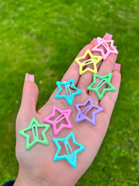 Stars glitter cute pastel star hair clips 90s 80s style weird wacky funky banana apple clips hair accessories  Pack of 6 mix of stars and fruits  6 random colours  Super cute! Great for a present or treat Will come in an organza gift bag! Decora Kei Accessories, Pastel Random, Cute Hairclips, Kidcore Accessories, Decora Accessories, Apple Hair, Hair Clips 90s, Stars Glitter, Scene Accessories