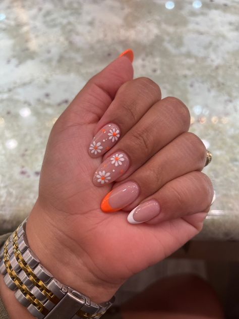 summer nails #flowers #orange #almondnails Pastel Orange Nails With Flowers, Summery Flowery Nails, Orange Nails White Flowers, Orange And Flower Nails, Almond Nails Orange French Tip, Orange And White Short Nails, Orange Nails Acrylic Square, White Tips With Flowers Nails, White And Orange French Tip Nails