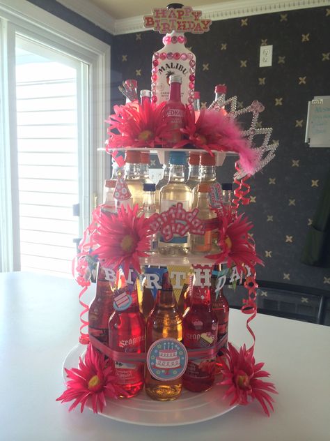 21st Birthday Booze Cake, Booze Cake Tower, Alcohol Tower, Booze Cakes, 21st Birthday Gift Baskets, 21 Bday Ideas, Diy 21st Birthday Gifts, Rhinestone Bottle, Booze Bouquet