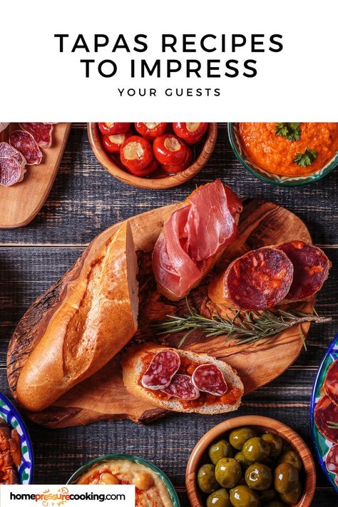 a wide spread of Tapas Recipes authentic Spanish Tapas Charcuterie Board, Tapas Style Food, Tapas Dinner Party Ideas, Spanish Tapas Ideas, Spanish Recipes Authentic, Authentic Spanish Tapas Recipes, Tapas At Home, Spanish Tapas Party, Tapas Ideas