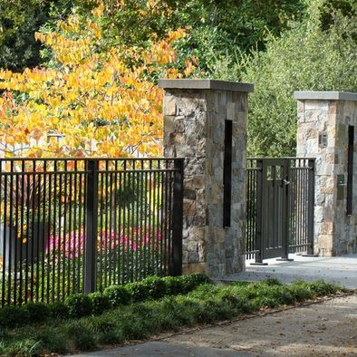 black metal fencing | Stone Gate pillars & black metal fence Gard Modern, Tor Design, Garden Gate Design, Front Fence, Stone Pillars, Wrought Iron Fences, Front Yard Fence, Stone Columns, Lan Can