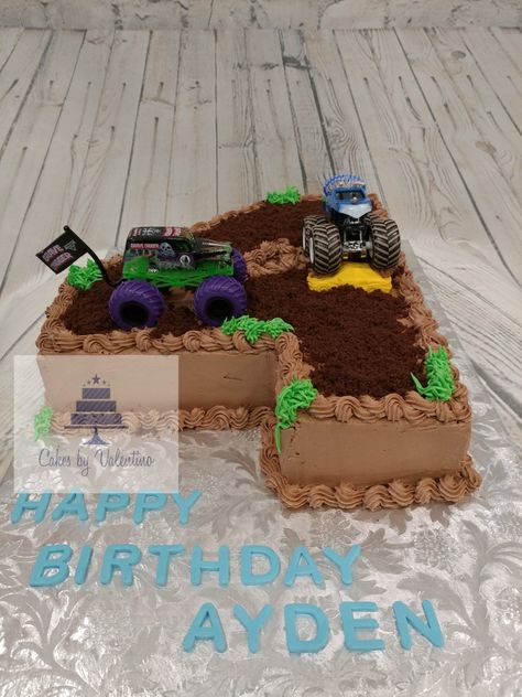 Hand carved number 4 cake with monster truck theme. Number 2 Cake Monster Truck, 4 Monster Truck Cake, Monster Truck Cake 4, Monster Truck Number Cake, Number 3 Monster Truck Cake, Number 4 Cake Boy, Monster Truck Pull Apart Cupcakes, Tonka Truck Cake, Monster Truck Theme Birthday Party