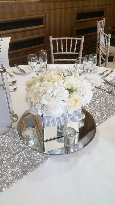 Silver And White Quinceanera Decorations, Silver Centerpiece Wedding, Glass Table Decoration, Round Table Centerpieces Wedding, Silver Wedding Anniversary Party, Silver Wedding Centerpieces, Silver And White Wedding, 60th Wedding Anniversary Party, Elegant And Romantic Wedding