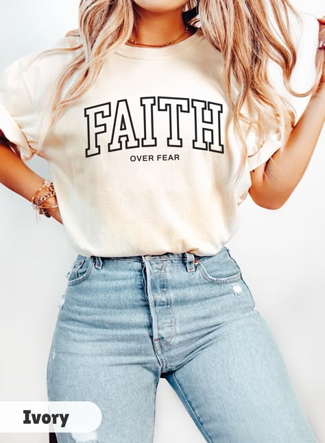 Embrace your faith with our Boho Christian Comfort Colors Shirt, featuring a Faith Over Fear T-shirt design, an inspiring Bible verse. This retro Christian shirt is a perfect religious Jesus tee and makes an ideal Christianity gift for women who love stylish and meaningful jesus apparel. Welcome to Gift Vibe Shop - Your Fashion Wonderland! **SIZING** The shirts are unisex and run true to size, but size up for a more oversized fit. Please refer to the photo cards for a detailed size guide. ** SHI Vinyl Shirt Ideas For Women Christian, Christian T Shirt Ideas Women, Bible Verse Shirts For Women, Cute Christian T Shirts, Faith Shirts For Women, Cricut Shirt Ideas Women, Christian Comfort, Jesus Apparel, Cricket Machine