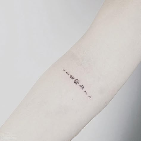 Tiny lunar phases inked on the right forearm by Estelle Smol Tattoos, Moon Tattoo Wrist, Puzzle Tattoo, Moon Phases Tattoo, Planet Tattoos, Lunar Phases, Mini Tattoo, Disney Tattoo, E Tattoo