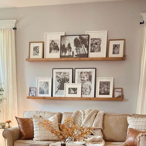 Check more at https://creativedecordesign.com/2024/06/13/12327/ Next To The Tv Decor, Pictures On Wall Shelf, Gallery Wall On Shelf, Photo On Shelf, Back Of Living Room Ideas, Picture Wall Living Room Farmhouse, Living Room Picture Frame Ideas, Over The Couch Photo Display, How To Style Wall Decor