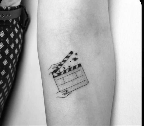 Writer Tattoos For Women, Take Action Tattoo, Cinema Tattoo Ideas Minimalist, Small Movie Tattoos, Cinema Tattoo Ideas, Film Tattoo Ideas Movies, Movie Tattoos Minimalist, Cinema Tattoo, Writer Tattoo