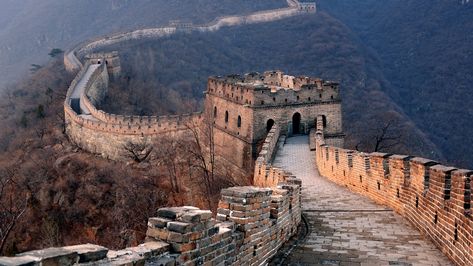 It’s only a myth that you can see the Great Wall from space, but regardless, it’s still an awe-inspiring feat. Jinshanling is the wall’s best hiking route, which goes from Jinshanling to Simatai. It’s half restored but half left to nature, making it one of the most beautiful sections.  If you want a more unique experience, head to Simatai – the only section open after dark – to see the wall lit up by night. China Facts, Asia Cruise, Explore China, Visit China, Genghis Khan, Great Wall Of China, China Travel, Great Wall, Ancient Ruins