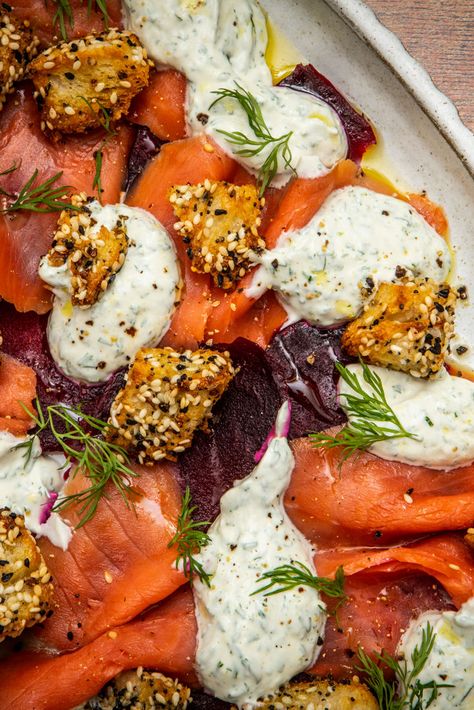 This elegant and festive platter starts with thinly sliced roasted beetroot and is topped with LEAP wild Alaska smoked salmon, a creamy dill-tahini sauce and seedy croutons inspired by ‘everything bagel’ seasoning. Roasted Beetroot, Beetroot Recipes, Dill Salmon, Everything Bagel Seasoning, Great British Chefs, Beetroot Salad, Bagel Seasoning, Clean Food Crush, Recipes Appetizers And Snacks