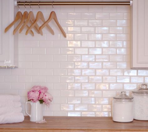 White subway tile and butcher block top laundry room budget renovation Laundry Room Budget, Laundry Room Backsplash, Laundry Room Counter, Countertop Covers, Pink Laundry Rooms, Laundry Room Countertop, Room Storage Diy, French Country Bathroom, Laundry Room Shelves