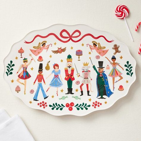 Inspire visions of sugar plum fairies when you serve holiday dishes on this Nutcracker platter, featuring characters from the classic ballet. The festive design is durably crafted and dishwasher-safe for convenient care. Created by Rifle Paper Co., a stationery and lifestyle brand based in Winter Park, Florida, founded in 2009 by husband-wife team Nathan and Anna Bond. Anna's hand-painted illustrations and distinctive color palette are at the heart of the brand, and their thoughtfully designed line of stationery, home decor and gifts create moments of unexpected beauty in the real world. KEY PRODUCT POINTS Plate is crafted of melamine. Pottery Barn Kids exclusive on decal artwork. BPA- and Lead-free. Dishwasher-safe. Note: do not microwave. Imported. Sugar Plum Decorations, The Nutcracker Ballet Christmas Decor, Nutcracker Ballet Decor, Christmas Painted Pottery, Nutcracker Plates, Nutcracker Themed Christmas Decor, Christmas Pottery Painting, Pottery Barn Christmas Decor, Classic Christmas Decor