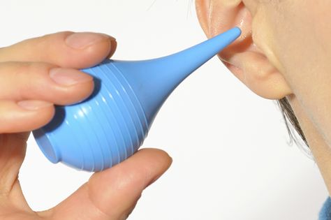 To clean your ears safely and remove ear wax, place a few drops of mineral oil or water into the ear canal and rinse with a stream of saline solution. How To Unplug Ears, Clean Ear Wax Out, Unclog Ears, Earwax Candle, Ear Wax Candle, Earache Remedies, Clogged Ears, Ear Cleaning Wax, Ear Wax Buildup