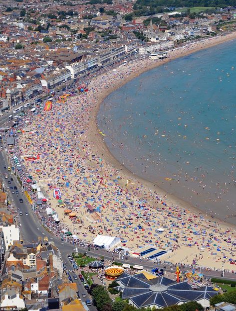 Weymouth Beach, Dorset, England | Temperatures set to soar in one-day heatwave... but thunder is on the ... Weymouth England, Weymouth Beach, Portland Dorset, Weymouth Dorset, Dorset Coast, Uk Beaches, Dorset England, Uk History, Going To Rain