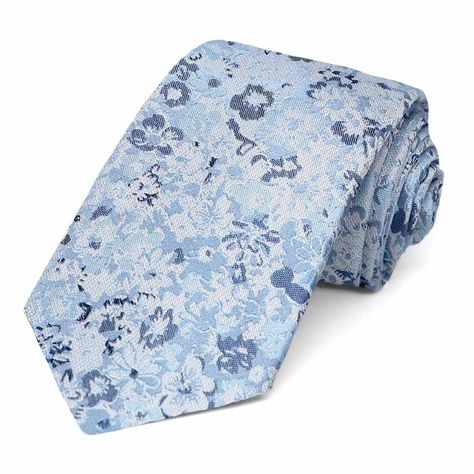 PRICES MAY VARY. Regent Morris Neckwear Narrow 3" width, at the widest point 57" length, tip to tip Matching keeper loop Made from 50% Silk, 50% Viscose Hello, wedding season! This steel blue floral tie is stunning for groomsmen attire. Bold florals are trending right now, but this low-key pattern will stay timeless. There are a few lighter and darker blue hues in the pattern, so it works well with many different blue shades. As far as the rest of the ensemble, we really like this tie with navy Blue Floral Tie, Steel Blue, Blue Hues, Necktie, Floral Tie, Blue Floral, Floral Pattern, It Works, Wedding Day