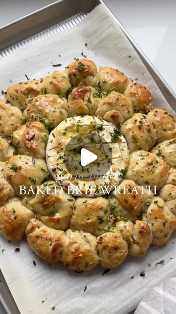 Nicolle | Cheese, Wine, Easy Appetizers & Recipes on Instagram: "RECIPE HERE ✨⬇️ Welcome to baked brie WEEK day one, we are making my classic garlic butter baked brie but in a crispy herby edible wreath 🧀🤤🎄 and follow along for a weeks worth of baked brie recipes to come! What you’ll need: 🧀 8oz brie cheese wheel 🧀 5 tbsp melted butter 🧀 garlic (2-3 cloves chopped finely) 🧀 pizza dough 🧀 one egg (egg wash) 🧀 fresh parsley & rosemary (chopped finely) Heat oven to 425. On a sheet pan, lined with parchment paper, add your brie cheese in the middle. Score the top of your brie. Roll your pizza dough into small balls and add them around your brie cheese forming a wreath. The dough balls should be touching one another. Brush only your pizza dough balls with a bit of egg wash. Add half yo Pizza Dough Balls, Edible Wreath, Baked Brie Recipes, Egg Egg, Cheese Wheel, Cheese Wine, Brie Recipes, One Egg, Easy Appetizers