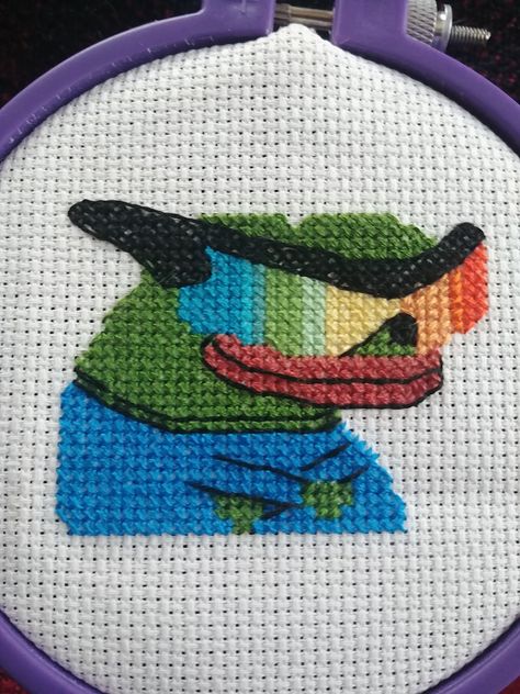 "Wicked Pepe cross stitch pattern for beginners Minimal materials required (not included): 13 colors of embroidery floss and 6\" x 4\" of 14 count aida cloth. Wicked Pepe cross stitch pattern - Pattern in symbols with floss legend - List of DMC thread colors (instruction and key section); - List of calculated thread length. SIZE: AIDA FABRIC 14, 6 x 3.5 inches. You can use Aida 16 or 18 if you want smaller versions. COLORS: 13 VERY EASY PATTERN. NOTE: - This is a digital item. Etsy will be sent Gamer Crafts, Aida Fabric, Aida Cloth, Thread Colors, Dmc Thread, Embroidery Floss, Etsy Crafts, Simple Patterns, Cross Stitch Pattern