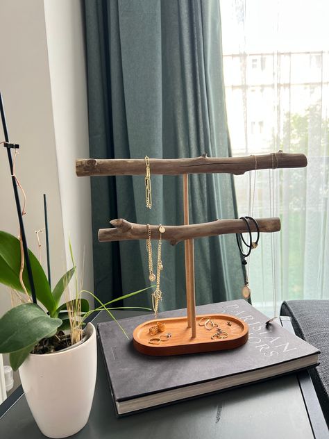 You have many options for storing your Jewelry. However, the most remarkable and natural among them is the driftwood jewelry and watch stand. A Driftwood Jewelry Stand is a jewelry stand made from pieces of wood by the sea that wear out over time. This stand allows you to display your jewelry and reach them easily. Also, driftwood pieces, each unique, add a rustic and bohemian vibe to your home. Wood Jewelry Organizer is not only practical, but also decorative. This stand, which you can put in a Boho Jewelry Stand, Driftwood Jewelry Display, Rustic Jewelry Organizer, Old Wood Table, Wooden Jewelry Stand, Rustic Jewelry Display, Wood Jewelry Diy, Sea Inspired Jewelry, Jewelry Booth