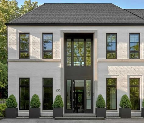 European inspired home with a dramatic black and white palette in Illinois Colonial Chic, Classic House Exterior, European House, Brick Facade, White Brick, Doors And Windows, Dream House Exterior, Brick House, Classic House